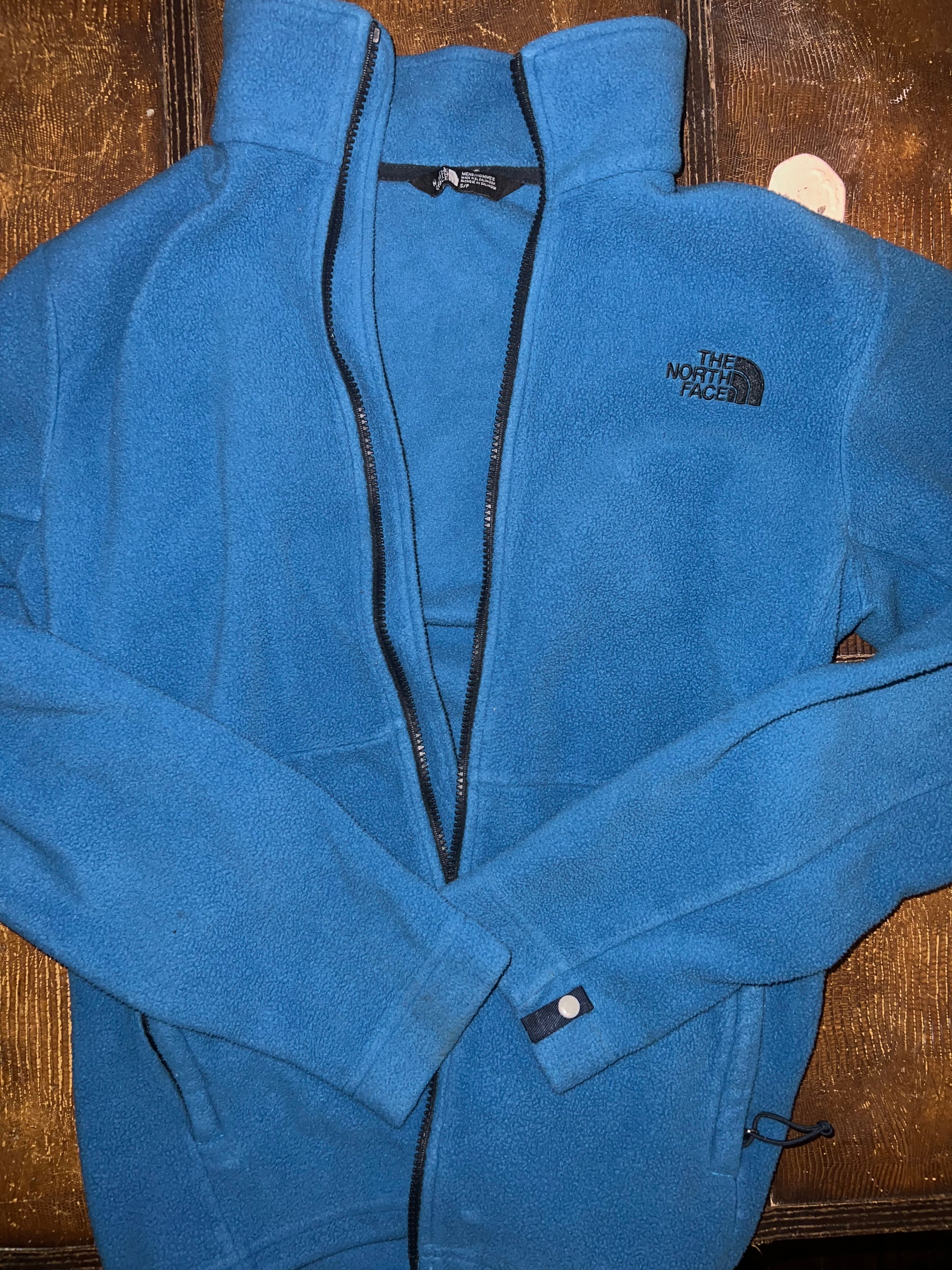 Small blue fleece north face jacket