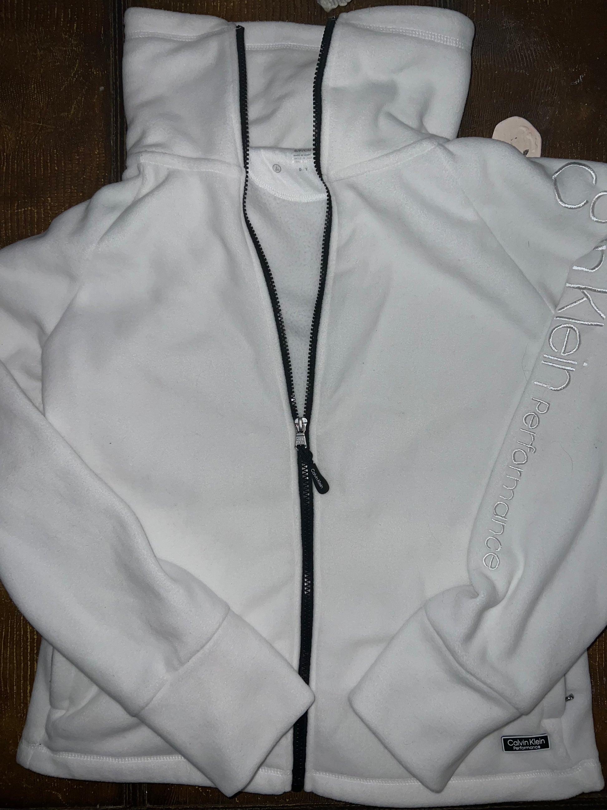 White Calvin Klein fleece pullover